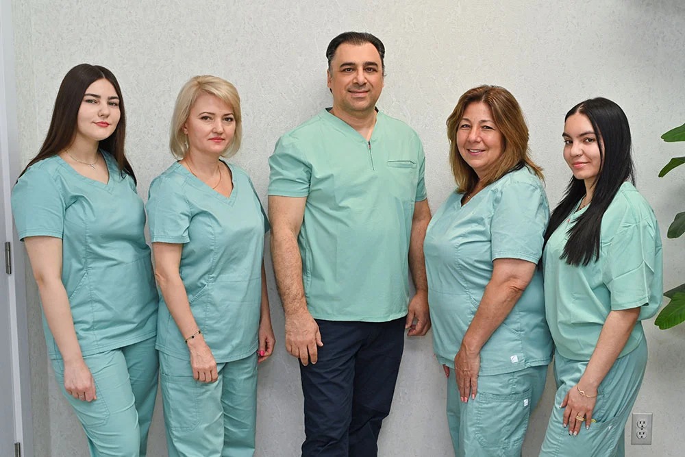 Dr. Mozner and the Creative Dental of Syosset team