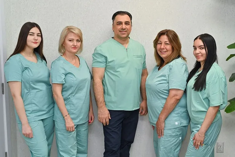 Dr. Mozner and the Creative Dental of Syosset team